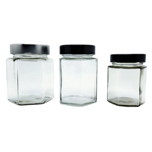 Fournisseurs chinois <span class=keywords><strong>de</strong></span> bocaux <span class=keywords><strong>en</strong></span> <span class=keywords><strong>verre</strong></span> avec couvercle à bouton <span class=keywords><strong>de</strong></span> sécurité doré, bocaux hexagonaux miniatures <span class=keywords><strong>de</strong></span> 250 ml, bouteille <span class=keywords><strong>en</strong></span> <span class=keywords><strong>verre</strong></span> - Product Image 1