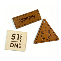 Patch en cuir véritable lavable avec logo personnalisé en relief, en gros, pour la réparation de jeans, vestes en denim et accessoires vestimentaires