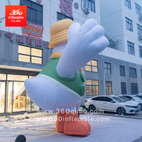 Grande mascotte de canard jaune gonflable publicitaire personnalisée pour les décorations extérieures accentuées par la lumière