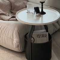 Canapé d'angle moderne italien minimaliste et circulaire Selle en cuir Bord en acier inoxydable Designer Balcon Petite table basse