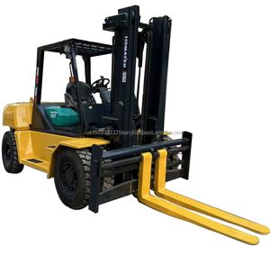 รถยกดีเซลโคมัตสึ FD100 มือสอง รับน้ำหนัก 10 ตัน ยกสูง 3 เมตร เสาสามท่อน สำหรับใช้งานนอกพื้นที่เรียบ - Product Image 1