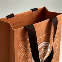 Sac cadeau en papier kraft écologique personnalisé, ruban en coton, impression de logo OEM pour l'emballage de cosmétiques, de parfums et de bijoux, vente en gros
