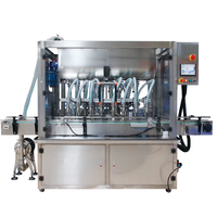 Machine de remplissage de liquides multi-têtes à pompe à piston automatique, idéale pour le lait, le vin et l'eau potable
