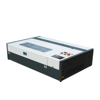 Mini machine de découpe/gravure laser CO2 à diode 3050 refroidie par eau 40W/50W avec rail de guidage PMI pour acrylique/estampes en caoutchouc DST/DXF