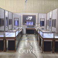 Vitrine murale en bois sur mesure OUYEE, présentoir à bijoux, accessoires or et argent, éclairage LED, garantie 3 ans
