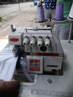 Machine à coudre surjeteuse industrielle manuelle Siruba série 700 modèle 747 757 737 à trois fils d'occasion en vente