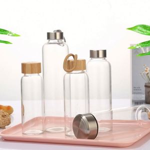 Bouteille d'eau en verre borosilicate haute qualité 500ml 1000ml avec logo personnalisé, réutilisable, avec couvercle métallique, pour boire directement, idéale pour le camping - Product Image 4