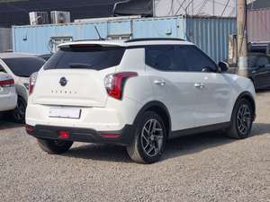 รถยนต์ Tivoli ปี 2022 สีขาว สภาพใหม่เอี่ยม เหมือนรถใหม่  เกียร์ออโต้ เบนซิน เทอร์โบชาร์จ  SUV ขนาดกะทัดรัด พร้อมระบบ LDWS เบาะอุ่น ไมล์เดิมจากโรงงาน - Product Image 2