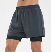 Shorts de sport décontractés pour hommes, taille élastique, mi-longueur, respirants, en polyester/coton, couleur unie, pour la course à pied et le fitness
