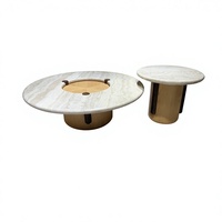 Ensemble de tables basses gigognes ivoire, modèle principal large et bas avec table d'appoint surélevée, texture subtile, pour maison moderne à plan ouvert