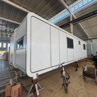 Capsule spatiale préfabriquée, cabine conteneur, installation rapide, maison modulaire compacte, unité de cuisine intégrée, bureau préfabriqué facilement déplaçable