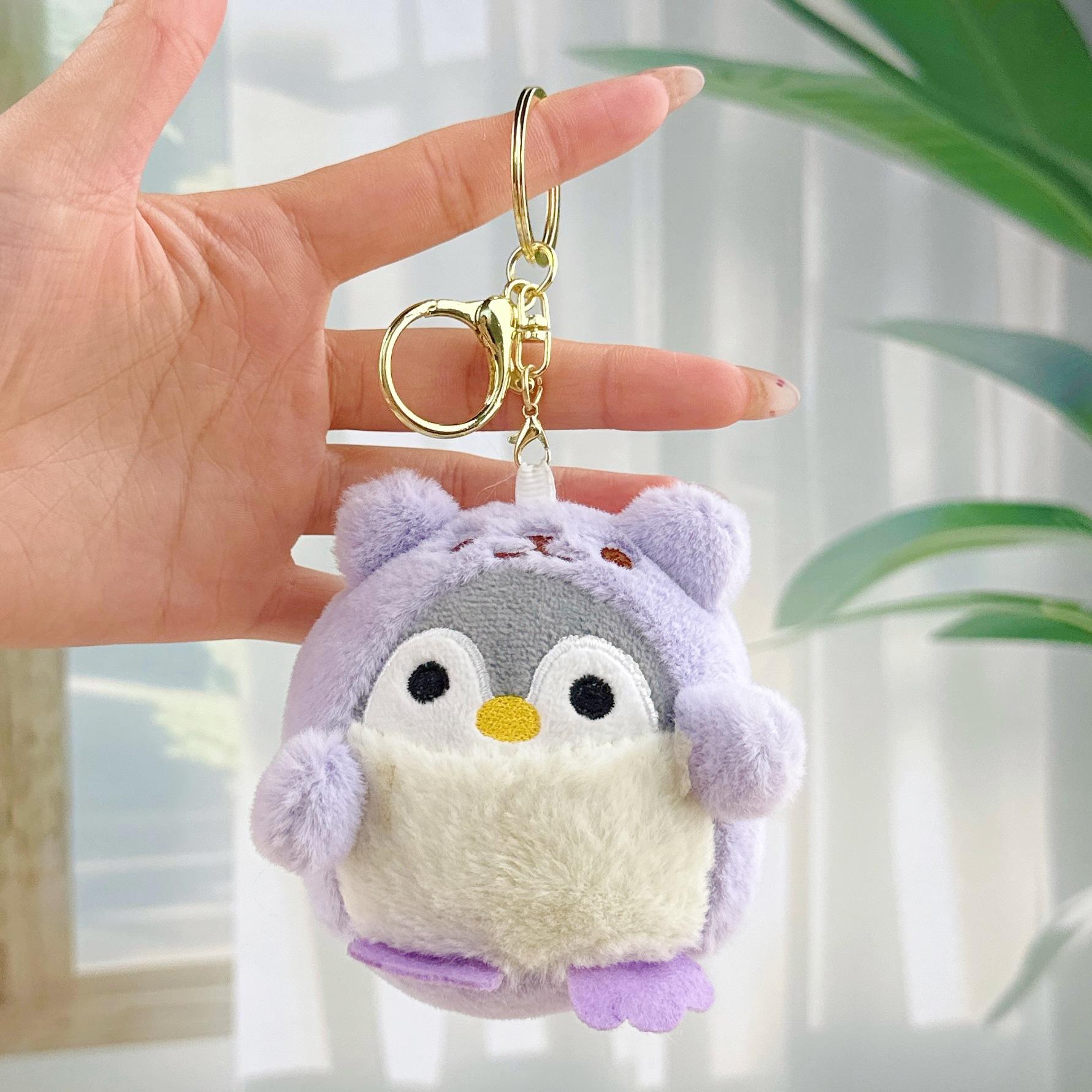 Cross-dressing penguin purple + gold buckle