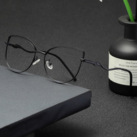 Lunettes photochromiques œil-de-chat en métal pour femmes 2026 – Monture optique photogris anti-lumière bleue – Style classique et haute qualité