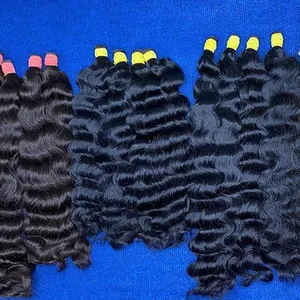 Vente en gros de cheveux humains vierges indiens vierges vietnamiens bruts ondulés en vrac tressage de cheveux humains pour le tressage