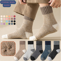 Chaussettes d'hiver pour hommes en laine épaisse, personnalisées avec logo OEM ODM, chaussettes thermiques confortables à blocs de couleur