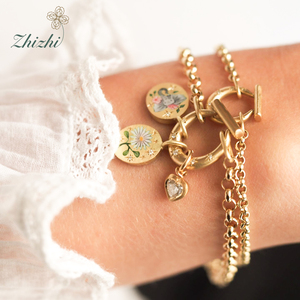 Elegante Collana con Ciondolo in Acciaio Inossidabile e Zirconi, Catena a Maglie e Pendente a Cuore Floreale Dipinto a Mano per uno Stile Grazioso - Product Image 1