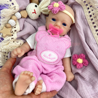Poupée Reborn Fille en Silicone de 12 Pouces avec Cheveux Implantés, Fabrication Personnalisée, Détails Réalistes des Veines, Prise en Charge du Logo Personnalisé, Commande en Gros