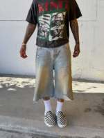 TOPSHOW Vente en gros Shorts en jean vintage pour hommes, style jorts, coupe ample, longueur genou, délavé, ourlet effiloché, déchiré