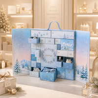 Calendrier de l'Avent de Noël à 24 tiroirs, motif flocon de neige bleu glace, boîte rigide en papier style valise, logo personnalisé OEM