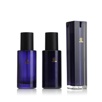 Flacon pompe pour fond de teint en verre à épaule plate bleu foncé de 100 ml de haute qualité avec bouchon noir mat
