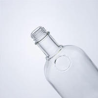 Bottiglia di Vetro Trasparente Rotonda per Liquori da 700ml 750ml con Chiusura a Vite, Personalizzabile all'Ingrosso