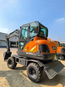 รถขุดตีนตะขาบขนาดกะทัดรัด Develon DX60W ECO พร้อมเครื่องยนต์ เกียร์ และปั๊มประสิทธิภาพสูงสำหรับโครงการในเขตเมือง - Product Image 4