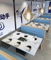 Table de restaurant commerciale coréenne pour barbecue et hot pot avec cuisinière à induction intégrée pour hôtels et restaurants