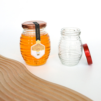 Forme de ruche bon marché 100ml 180ml 380ml 750ml Pot en verre fileté miel Pot de confiture Pot en verre de qualité alimentaire avec couvercle à vis en métal