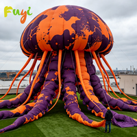 Mascotte méduse gonflable géante et colorée pour la décoration d'événements en plein air sur les toits