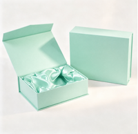 Boîte cadeau magnétique vert menthe à plat, peu encombrante, personnalisable, pliable, en carton rigide avec doublure en ruban de satin