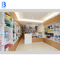Comptoir de pharmacie minimaliste moderne conception de grain de bois conception de caissier de pharmacie vitrine de magasin médical vente au détail personnalisée