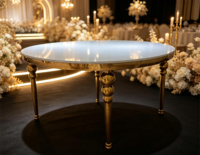 Table de banquet de luxe en verre rond avec base verticale en acier inoxydable doré pour location événementielle