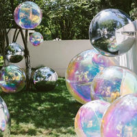 Ballon gonflable géant irisé métallique, décoratif, brillant, argenté et coloré, type globe ou boule miroir