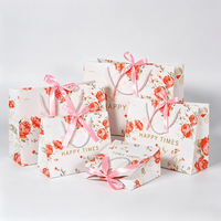 Sac cadeau écologique en papier à motif floral rose, avec logo personnalisé, ruban, nœud et poignée imprimée or, pour dragées de mariage, vente en gros