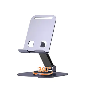 सबसे लोकप्रिय पोर्टेबल फोल्डेबल डेस्कटॉप स्टैंड एक सिलिकॉन एंटी स्लिप 360 डिग्री घूमने वाला सभी धातु फोन स्टैंड है