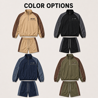 Ensemble de survêtement IKDEER personnalisé à blocs de couleurs, haut à demi-zip et short à cordon de serrage pour les loisirs en plein air et les activités quotidiennes