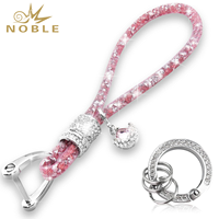 Porte-clés de poignet multicolore élégant avec breloque et pendentif décoratif, accessoire de mode pour sac, cadeau pour femme