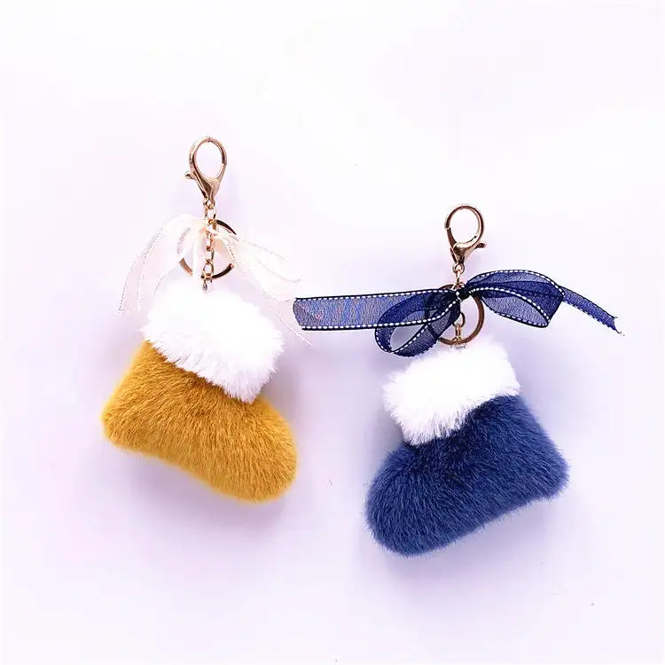 Vente en gros de bottes de Noël en feutre pelucheux nœud papillon porte-clés boule de fourrure porte-clés pompon accessoire suspendu