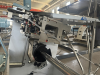 Caja de cartón PE Máquina de atado en espiral Paquete de atado de correa de PE Máquina de embalaje de flejado
