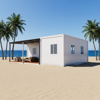 Villa préfabriquée de luxe en conteneur avec patio couvert à ossature métallique, unité d'habitation complète, OEM pour complexes hôteliers et glamping, direct usine
