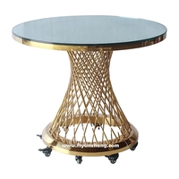 Chaise de salle à manger de luxe moderne, table ronde en acier inoxydable doré avec roulettes mobiles pour mariage, hôtel, extérieur, salon, etc.