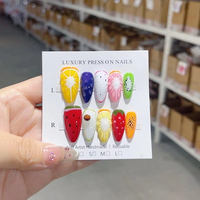 Ongles press-on à motif de fruits 3D - Faux ongles colorés, design pastèque et fraise, forme amande, pointes courtes, style français