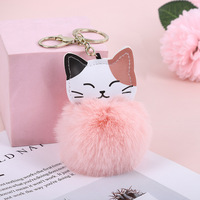 Porte-clés en fausse fourrure de lapin doux et mignon en cuir PU avec pompon en forme de boule de poils porte-clés pour femmes sac porte-clés de voiture pendentif