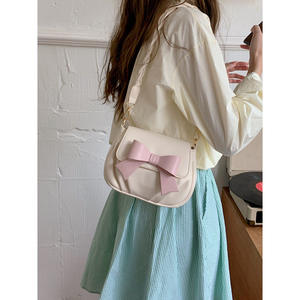 Sac rond mignon avec nœud papillon, couleur blanc cassé, boucle magnétique, bandoulière simple, style féminin, usage quotidien - Product Image 3