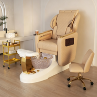 Fauteuil de pédicure professionnel moderne et luxueux pour salon de manucure, avec bain de pieds électrique.