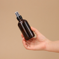 Tête de pulvérisation pompe pulvérisateur bouteille en verre 4oz 120ml huile essentielle corps vaporisateur bouteille en verre givré ambre Boston rond en gros