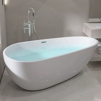 Baignoire autoportante en acrylique ovale blanche pour hôtels, maisons d'hôtes et petits appartements