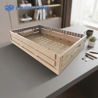 Caisse de rangement pliable en plastique à texture bois, ventilée et empilable, pour produits frais de supermarché