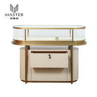 Vitrina de Joyería MASTER de Acero Inoxidable con Marco Dorado, Cerradura Mecánica, 135*55*101cm, con Luces