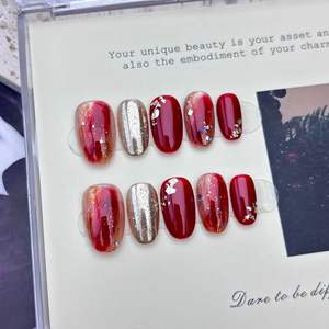 <span class=keywords><strong>Faux</strong></span> <span class=keywords><strong>ongles</strong></span> de luxe rouges avec motif feuille <span class=keywords><strong>d</strong></span>'<span class=keywords><strong>or</strong></span>, faits à la main, de haute qualité, à presser, avec effet œil de chat - Product Image 1